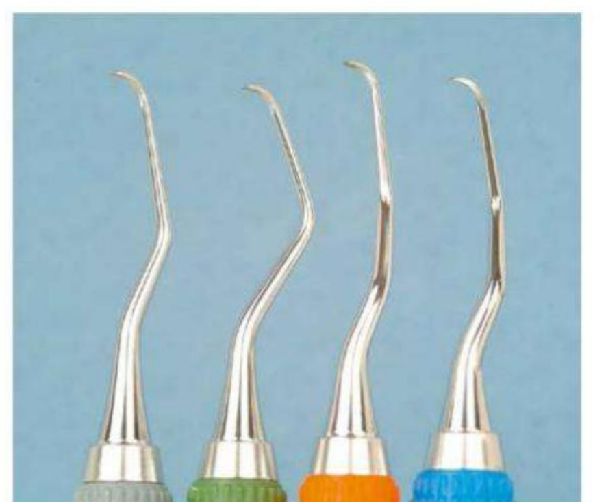 Fig. 51.27 Micro Mini Five Gracey curettes. Left to right, #1-2, #7-8, #11-12, #13-14. (Copyright A. Pattison.)
